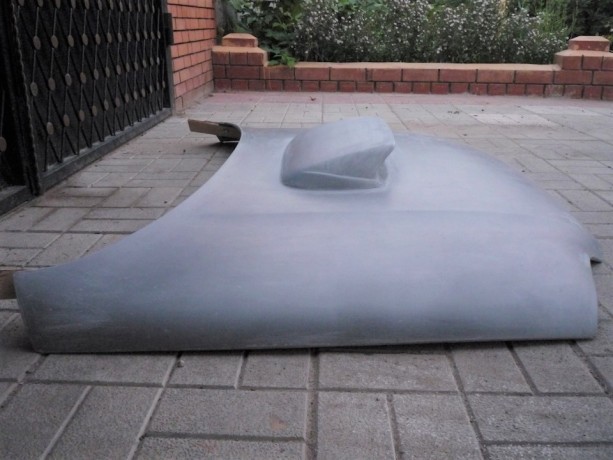 Капот с воздухозаборником "Subaru style" стеклопластиковый на Chevrolet Niv@ купить недорого с доставкой в Долгопрудный